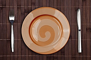 Bamboo placemat with plate fork and knife