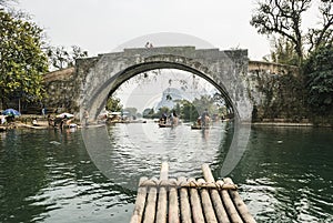 Bamboo rafting along Yulong River during the winter season with beauty of the landscape is a popular activity in Guilin.