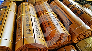 Bamboo slips of ancient Chinese writing photo