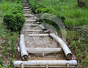 Bamboo staircase. Bamboo staircase in mountains. Outdoor active lifestyle travel adventure vacations hills landscape. Peaceful