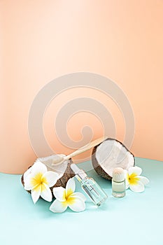 Bamboo toothbrush and bootle essential oil on a table with copy space on a white background. Styled composition of flat