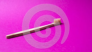 Bamboo toothbrush, top view, isolated