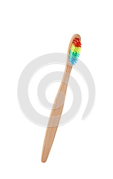 Bamboo toothbrush on white background