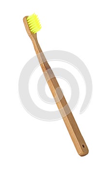 Bamboo toothbrush on white background.