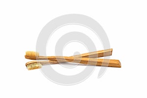 Bamboo toothbrush on white background