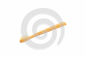 Bamboo toothbrush on white background