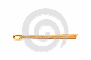 Bamboo toothbrush on white background