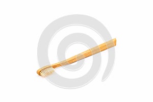 Bamboo toothbrush on white background