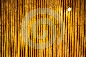 Bamboo Wall With A Light Bulb