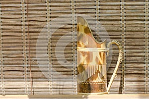 bamboo window curtain nd jug