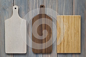 Bamboo wood cutting board on a wooden gray background