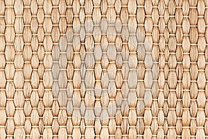 Bamboo woven beige mat handmade background.