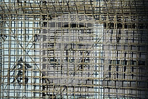 Bamboos scaffolding with the chinese word `warehouse`