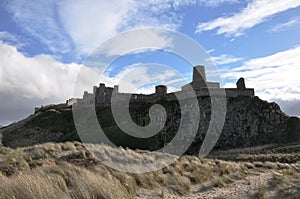 Bamburgh Castle In Northumberland across the dunes