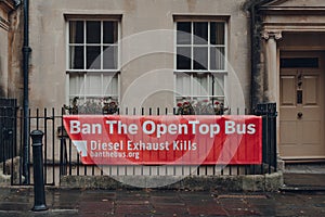 Ban the OpenTop Bus sign by the campaign against air pollution in Bath,Somerset, UK