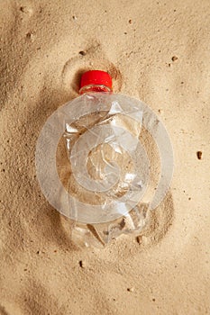 Ban plastic. ecology, environmental, plastic pollution. Ocean pollution. Top view on plastic in sand. Garbage on the beach concept