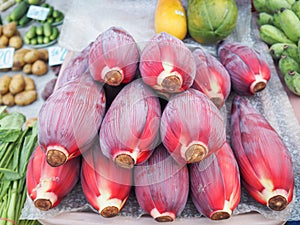 Banana blossom. Culantro and lemon grass for sale in market