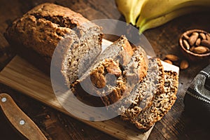 Banana Bread Loaf On Wooden Table