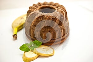 Banana Bundt Cakes on a Plate with Bananas