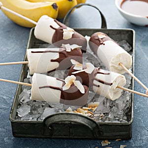 Banana and chocolate popsicles