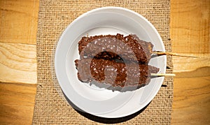 Banana coasted by chocolate which is very sweet,