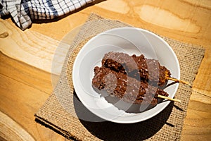 Banana coasted by chocolate which is very sweet,