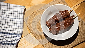 Banana coasted by chocolate which is very sweet,