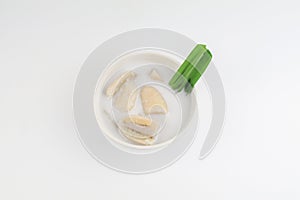 Banana in coconut milk (Kluay Buat Chi) on white background. Popular Traditional dessert