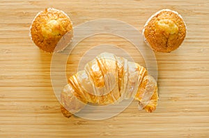 Banana cup cake and croissant