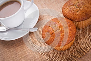 Banana cup cake on hessian mats and coffee cup