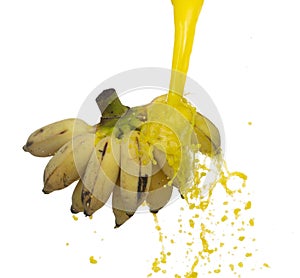 Banana flying explosion with fruit juice, Yellow Banana fresh vitamin water full complete size float in mid air. White background