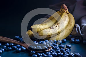 banana Fresh Blueberries blueberry Bowl Table Freshly picked glass bowl. Juicy fresh blueberries Bilberry dark food Background.