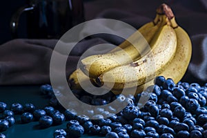 banana Fresh Blueberries blueberry Bowl Table Freshly picked glass bowl. Juicy fresh blueberries Bilberry dark food Background.