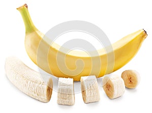Banana fruit with banana pieces on a white background.