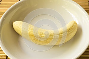 Banana fruit on white plate