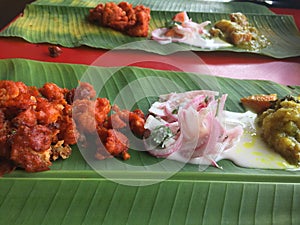 Banana-leaf rice- traditional meal origin from india
