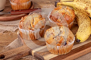 Banana Nut Muffins on a Wooden Board