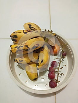 Banana, orange, grape fruits