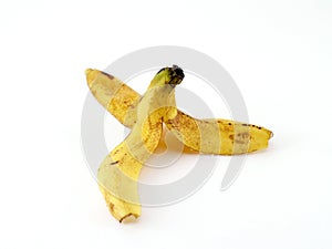 banana peel isolated on white background, sign idea beware slip