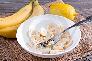 Banana puree in a bowl with a fork