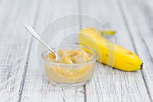 Banana Puree on wooden background