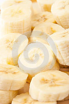 Banana slices background vertical