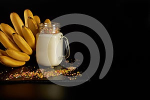 Banana smoothie with almond milk in glass cup. , Vegan food Concept