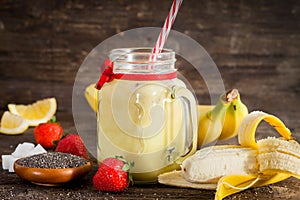 Banana smoothie in jar glass for healthy breakfast