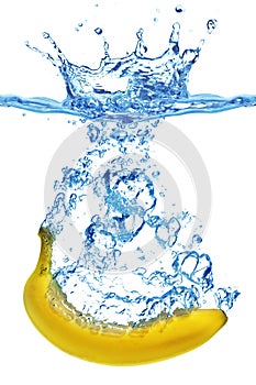 Banana splashing into water