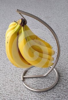 Banana in a steel hanger