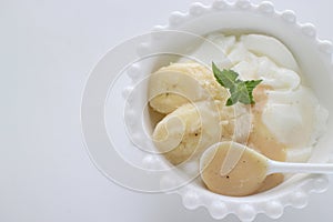 Banana and vanilla condense milk in bowl