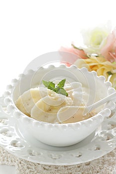 Banana and vanilla condense milk in bowl