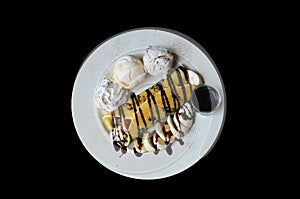 Banana waffle with ice cream and chocolate topping