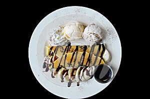 Banana waffle with ice cream and chocolate topping